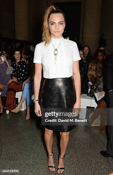 Cara Delevingne attends the Topshop Unique show during London Fashion Week Fall/Winter 2015/16 at Tate Britain on February 22, 2015 in London,...