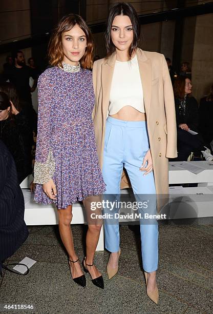 Alexa Chung and Kendall Jenner attend the Topshop Unique show during London Fashion Week Fall/Winter 2015/16 at Tate Britain on February 22, 2015 in...