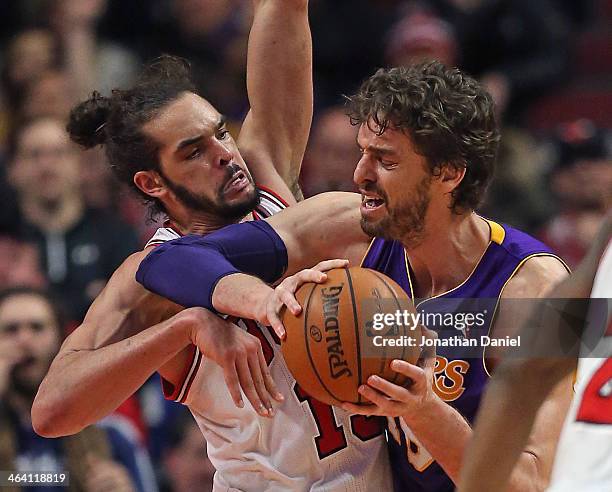 Joakim Noah of the Chicago Bulls pressures Pau Gasol of the Los Angeles Lakers at the United Center on January 20, 2014 in Chicago, Illinois. The...