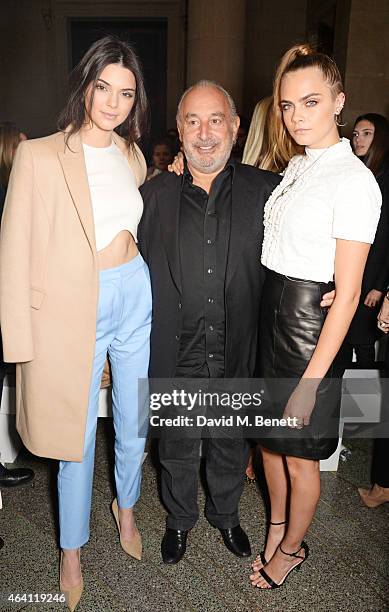 Kendall Jenner, Sir Philip Green and Cara Delevingne attend the Topshop Unique show during London Fashion Week Fall/Winter 2015/16 at Tate Britain on...