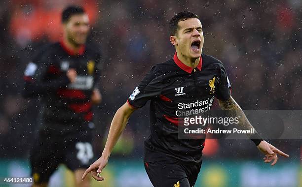 Philippe Coutinho of Liverpool celebrates after scoring the opening goal during the Barclays Premier League match between Southampton and Liverpool...