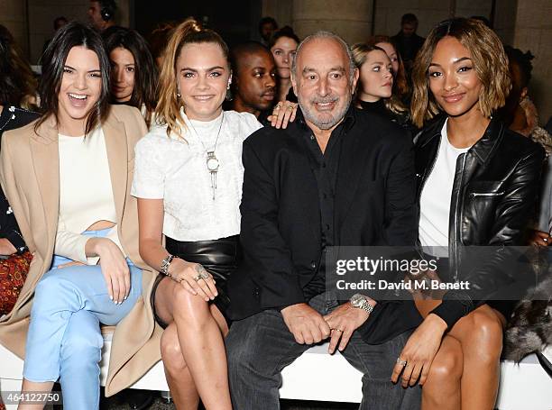 Kendall Jenner, Cara Delevingne, Sir Philip Green and Jourdan Dunn attend the Topshop Unique show during London Fashion Week Fall/Winter 2015/16 at...