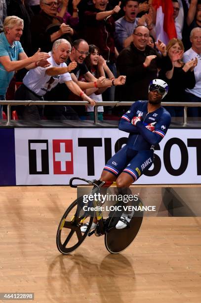 France's Gregory Bauge celebrates after winning gold in the Men's Sprint finals at the UCI Track Cycling World Championships in...