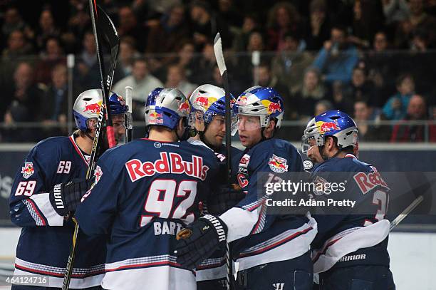 Garrett Roe of EHC Muenchen and team mates celebrate a goal during the DEL Ice Hockey match between EHC Muenchen and Eisbaeren Berlin on February 22,...