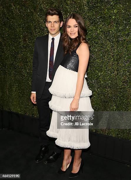 James Righton and Keira Knightley attend the Chanel And Charles Finch Pre-Oscar Dinner at Madeo Restaurant on February 21, 2015 in West Hollywood,...
