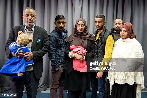 The families of Amira Abase and Shamima Begum, the three missing schoolgirls believed to have fled to Syria to join Islamic State, pose after being...