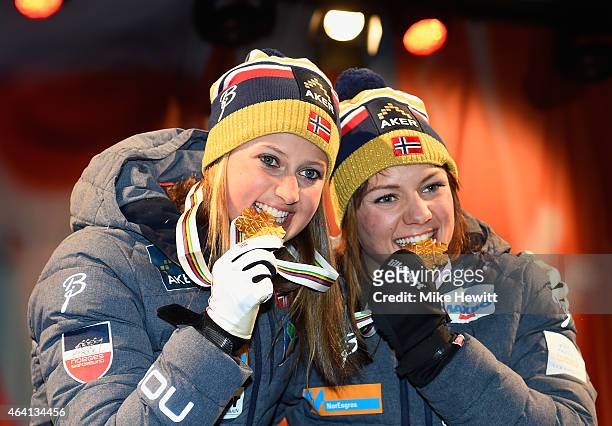 Gold medallists Ingvild Flugstad Oestberg and Maiken Caspersen Falla of Norway pose during the medal ceremony for the Women's Cross-Country Team...