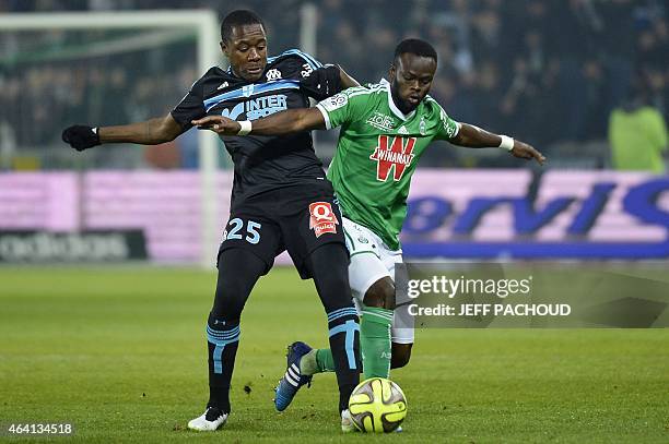 Marseille's French midfielder Giannelli Imbula vies with St Etienne's Ivorian midfielder Ismael Diomande during the French L1 football match AS...