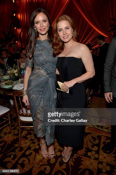 Fashion designer Georgina Chapman and actress Amy Adams attend The Weinstein Company's Academy Awards Nominees Dinner in partnership with Chopard,...