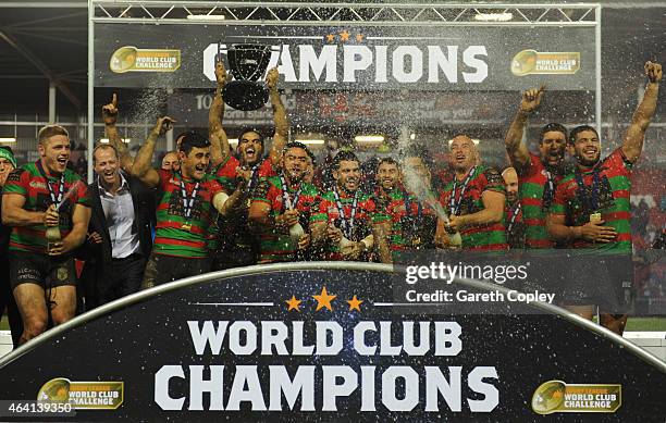 South Sydney Rabbitohs celebrate with the trophy after victory in the World Club Challenge match between St Helens and South Sydney Rabbitohs at...