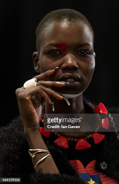 Model prepares backstage at the Vivienne Westwood Red Label show during London Fashion Week Fall/Winter 2015/16 at Science Museum on February 22,...