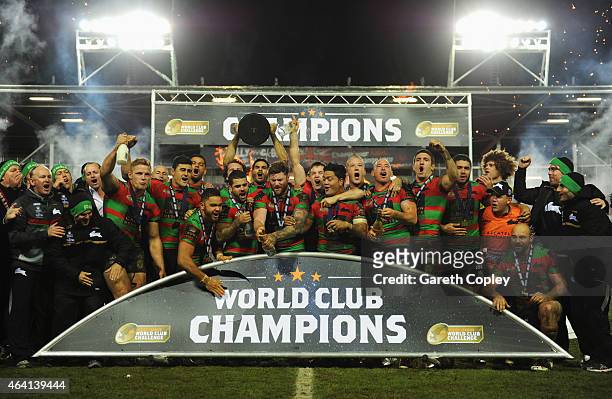 South Sydney Rabbitohs celebrate with the trophy after victory in the World Club Challenge match between St Helens and South Sydney Rabbitohs at...