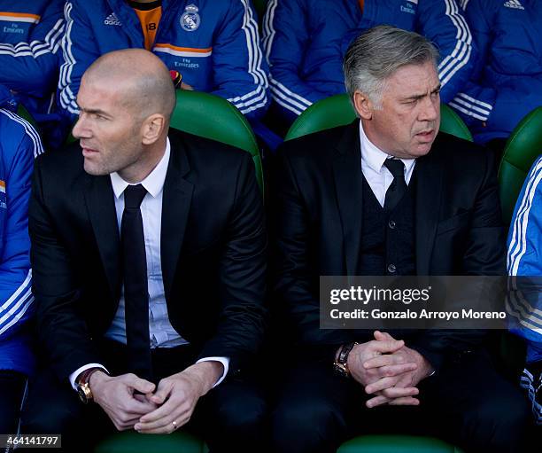 Head coach Carlo Ancelotti (R9 of Real Madrid CF and his assistant coach Zinedine Zidane looks on sitted on the bench prior to start the La Liga...