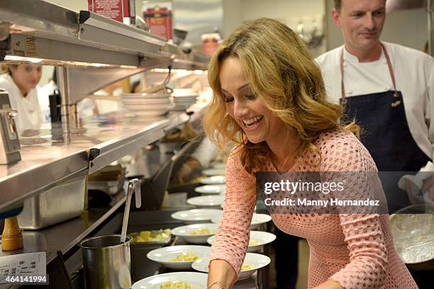 Giada De Laurentiis prepares food at A Perfect Pairing: A Brunch hosted by Giada De Laurentiis and Andrew Carmellini during 2015 Food Network &...