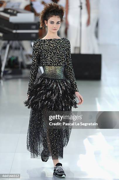 Model walks the runway during the Chanel show as part of Paris Fashion Week Haute-Couture Spring/Summer 2014 on January 21, 2014 in Paris, France.