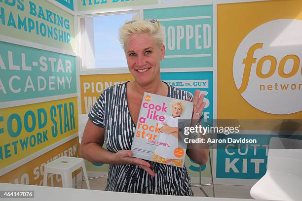 Chef Anne Burrell signs books at the KitchenAid Culinary Demonstrations during the 2015 Food Network & Cooking Channel South Beach Wine & Food...