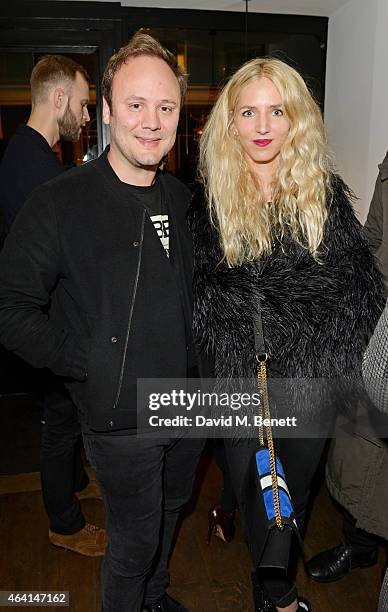 Nicholas Kirkwood and Charlotte Tarbouriech attend the Delfina Delettrez London boutique opening dinner during London Fashion Week Fall/Winter...