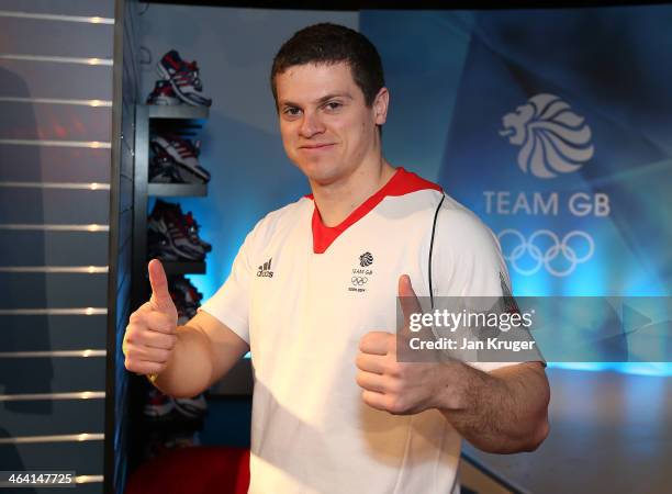 Craig Pickering of Great Britain tries on his uniform during the Team GB Kitting Out ahead of Sochi Winter Olympics on January 21, 2014 in Stockport,...
