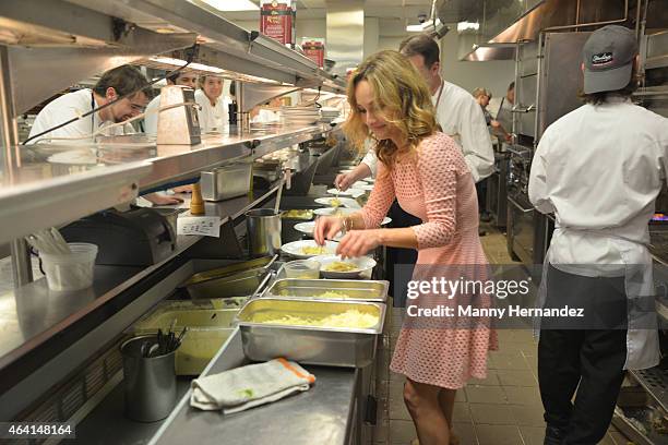 Chef Giada De Laurentiis prepares food at A Perfect Pairing: A Brunch hosted by Giada De Laurentiis and Andrew Carmellini during 2015 Food Network &...