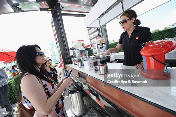 Guests enjoy illy at illy Push Button Cafe at The Food Network & Cooking Channel South Beach Wine & Food Festival Presented By FOOD & WINE on...