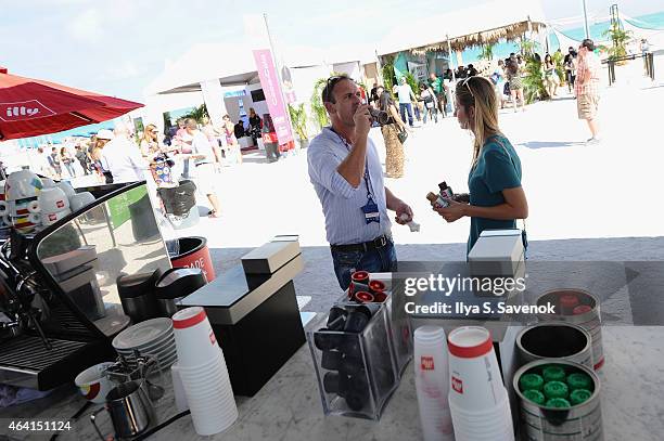 Guests enjoy illy at illy Push Button Cafe at The Food Network & Cooking Channel South Beach Wine & Food Festival Presented By FOOD & WINE on...