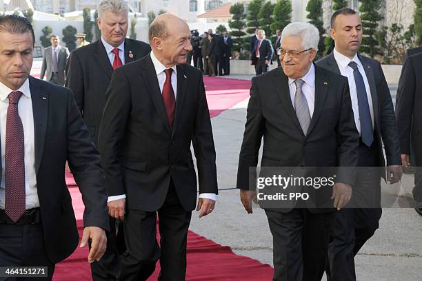 In this handout image supplied by the Palestinain Press Office , Palestinian President Mahmoud Abbas attends a welcome ceremony with Romanian...