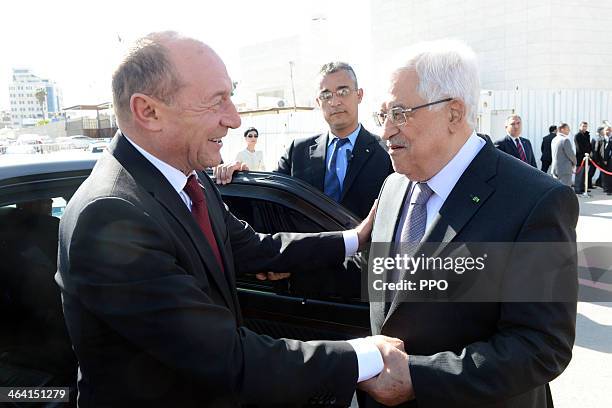 In this handout image supplied by the Palestinain Press Office , Palestinian President Mahmoud Abbas attends a welcome ceremony with Romanian...