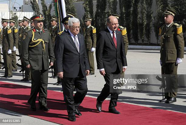 In this handout image supplied by the Palestinain Press Office , Palestinian President Mahmoud Abbas attends a welcome ceremony with Romanian...