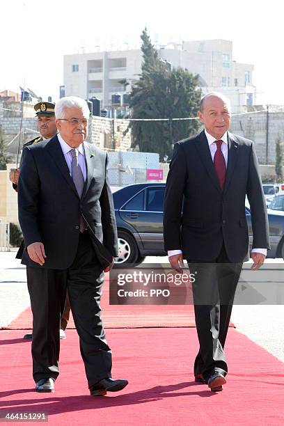 In this handout image supplied by the Palestinain Press Office , Palestinian President Mahmoud Abbas attends a welcome ceremony with Romanian...