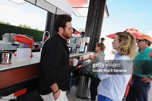 Chef Scott Conant and a guest attend illy Push Button Cafe at The Food Network & Cooking Channel South Beach Wine & Food Festival Presented By FOOD &...