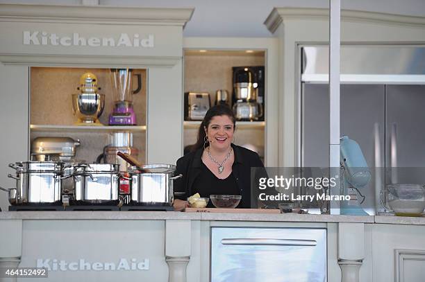 Chef Alex Guarnaschelli prepares food with KitchenAid at the Whole Foods Market Grand Tasting Village featuring MasterCard Grand Tasting Tents &...
