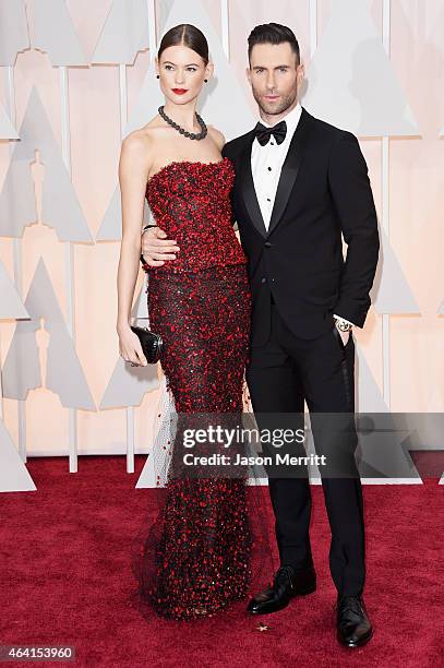 Recording artist Adam Levine and Behati Prinsloo attend the 87th Annual Academy Awards at Hollywood & Highland Center on February 22, 2015 in...