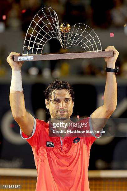 David Ferrer of Spain celebrates his win over Fabio Fognini of Italy during the final of the Rio Open at the Jockey Club Brasileiro on February 22,...