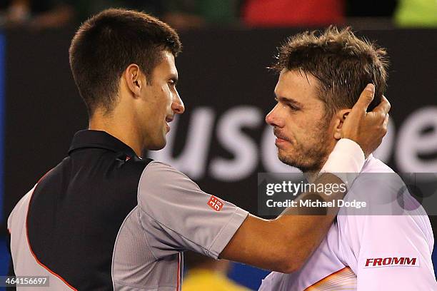 Stanislas Wawrinka of Switzerland celebrates winning in his quarterfinal match against Novak Djokovic of Serbia during the 2014 Australian Open at...