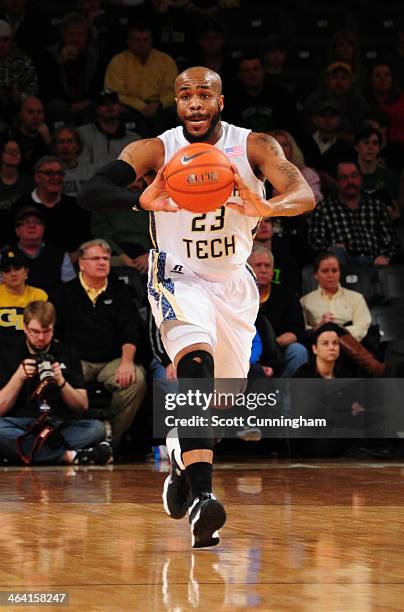 Trae Golden of the Georgia Tech Yellow Jackets passes against the Notre Dame Fighting Irish at McCamish Pavilion on January 11, 2014 in Atlanta,...