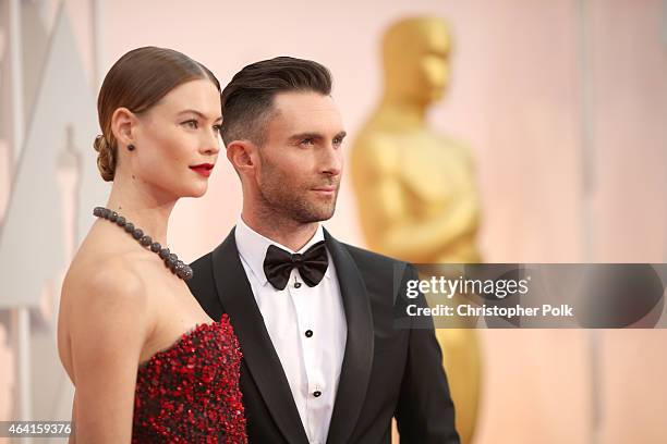 Recording artist Adam Levine and Behati Prinsloo attend the 87th Annual Academy Awards at Hollywood & Highland Center on February 22, 2015 in...