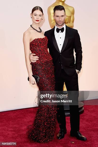 Singer Adam Levine and model Behati Prinsloo attend the 87th Annual Academy Awards at Hollywood & Highland Center on February 22, 2015 in Hollywood,...