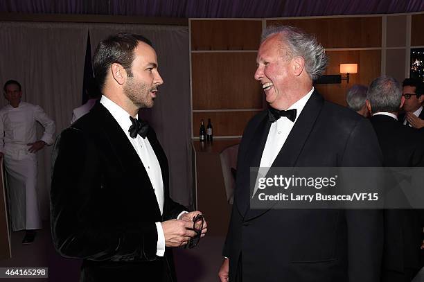 Fashion designer Tom Ford and Vanity Fair Editor-in-Chief Graydon Carter attend the 2015 Vanity Fair Oscar Party Viewing Dinner hosted by Graydon...