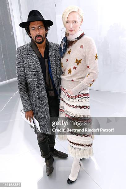 Fashion Designer Haider Ackermann and actress Tilda Swinton attend the Chanel show as part of Paris Fashion Week Haute Couture Spring/Summer 2014 on...