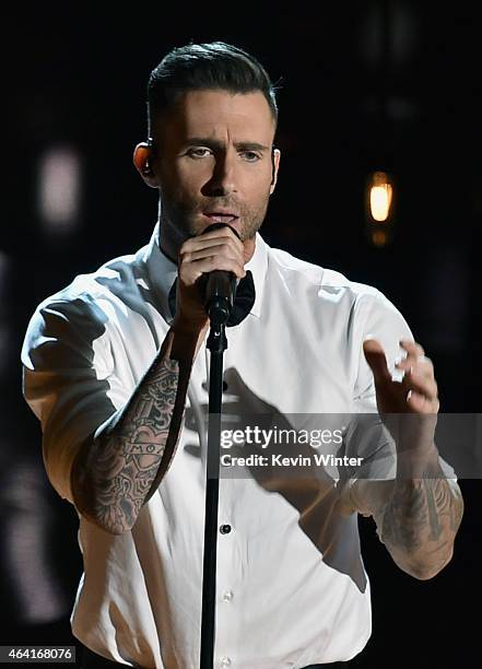 Singer Adam Levine of Maroon 5 performs "Lost Stars" from "Begin Again" onstage during the 87th Annual Academy Awards at Dolby Theatre on February...