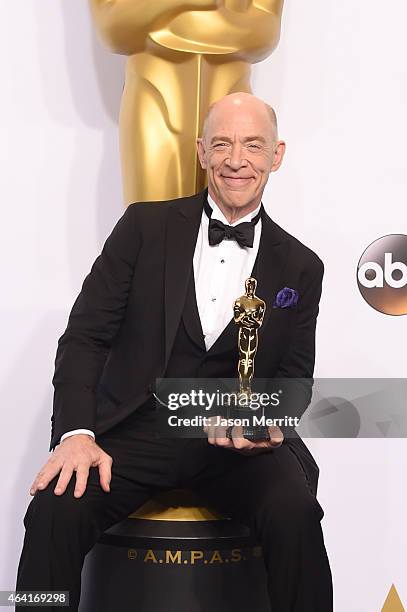 Actor J.K. Simmons, winner of Best Actor in a Supporting Role for "Whiplash", poses in the press room during the 87th Annual Academy Awards at Loews...