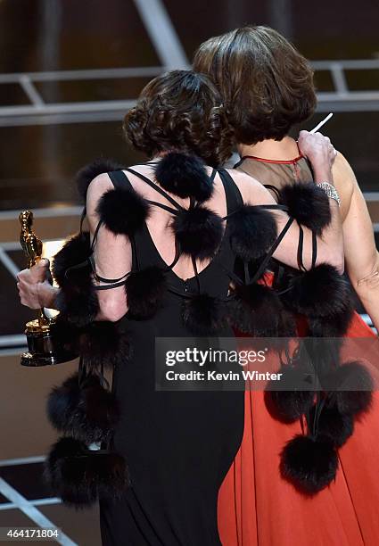 Producer Dana Perry and director Ellen Goosenberg Kent accept the Best Documentary Short Award for "Crisis Hotline; Veterans Press 1" onstage during...