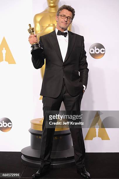 Director Pawel Pawlikowski, with the award for best foreign language film for "Ida", poses in the press room during the 87th Annual Academy Awards at...