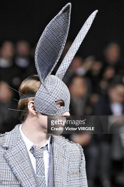 Model walks the runway during the Thom Browne Menswear Fall/Winter 2014-2015 show as part of Paris Fashion Week on January 19, 2014 in Paris, France.