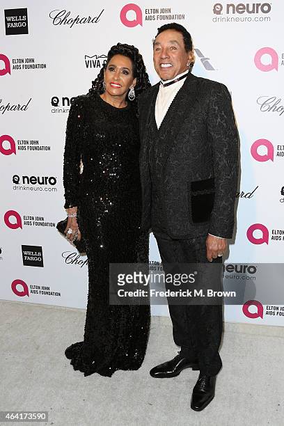 Designer Frances Robinson and singer Smokey Robinson attend the 23rd Annual Elton John AIDS Foundation's Oscar Viewing Party on February 22, 2015 in...