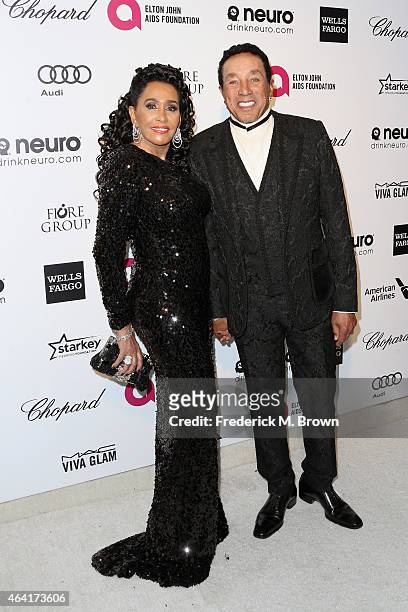 Designer Frances Robinson and singer Smokey Robinson attend the 23rd Annual Elton John AIDS Foundation's Oscar Viewing Party on February 22, 2015 in...