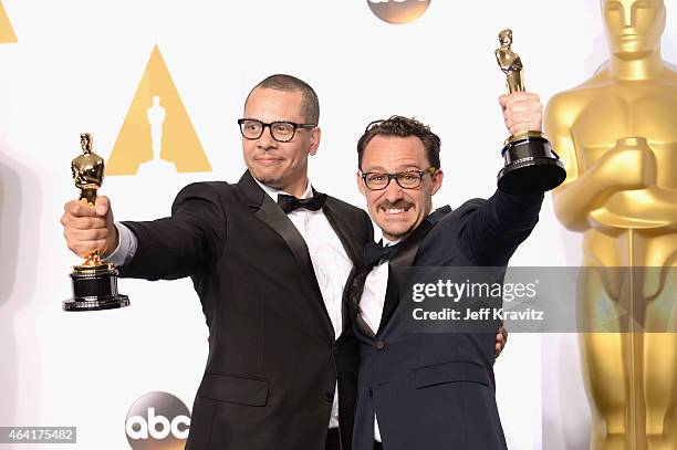 James Lucas and Mat Kirby, with the award for best live action short film for "The Phone Call", pose in the press room during the 87th Annual Academy...