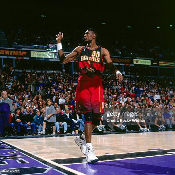Dikembe Mutombo of the Atlanta Hawks wags his finger during a game played against the Sacramento Kings circa 1998 at Arco Arena in Sacramento,...