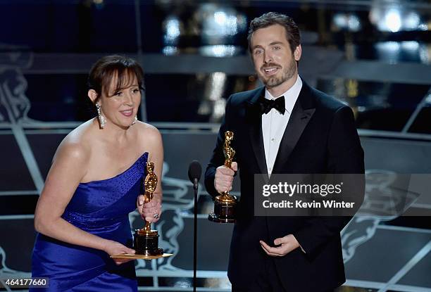 Patrick Osborne , and Kristina Reed accept the Best Animated Short Film Award for "Feast" onstage during the 87th Annual Academy Awards at Dolby...