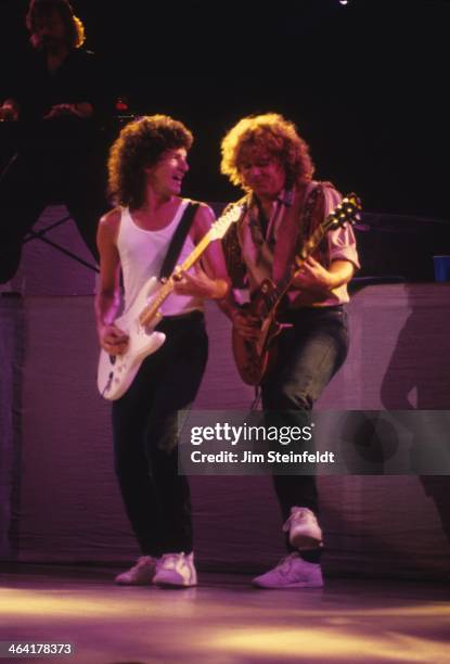 Speedwagon Kevin Cronin, and Gary Richrath, perform in Minnesota in 1987.